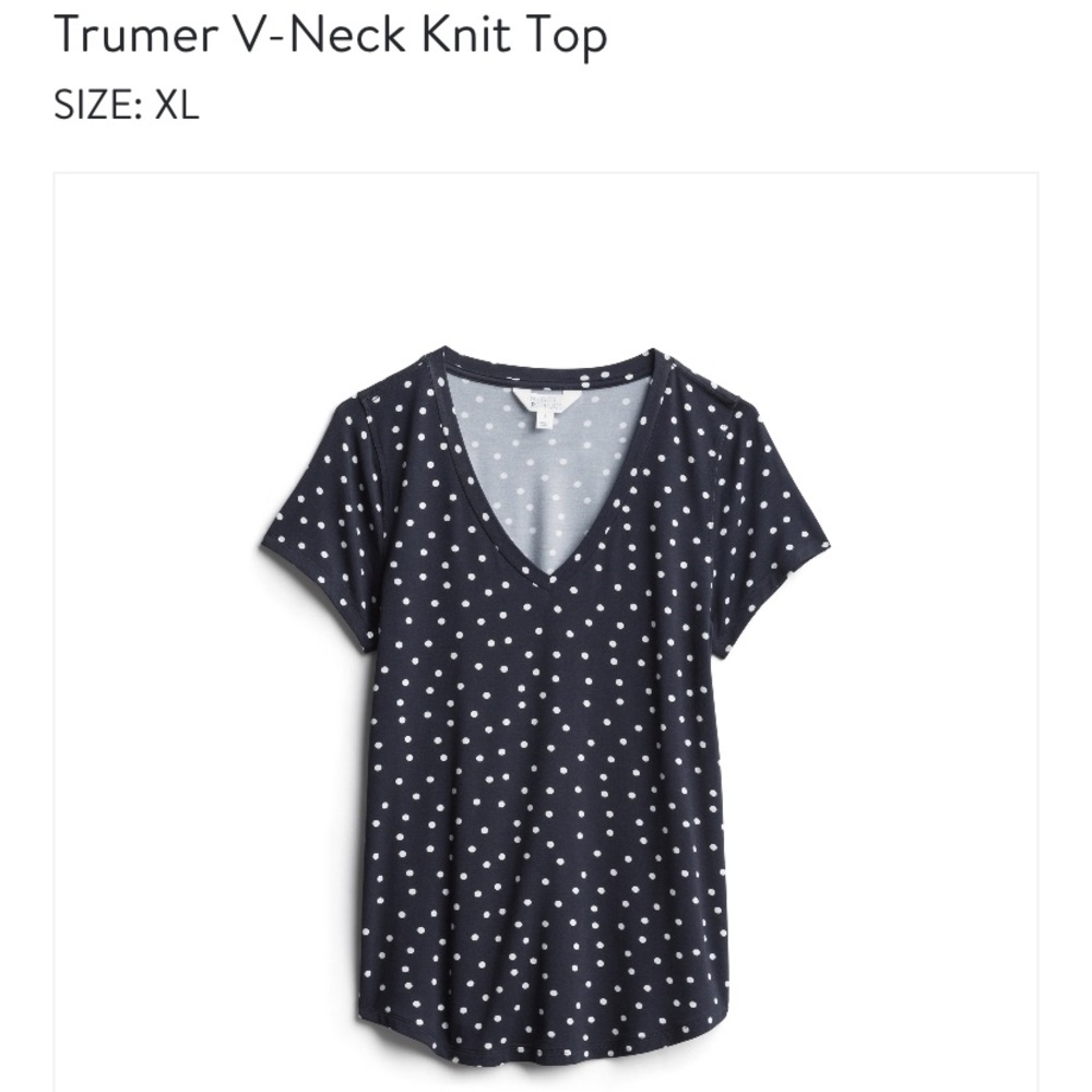 Love this shirt! Getting a bit too big on me!